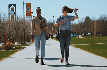 students walking on college campus